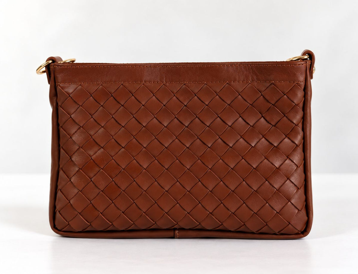 CLUTCH INTRECCIATA IN VERA PELLE