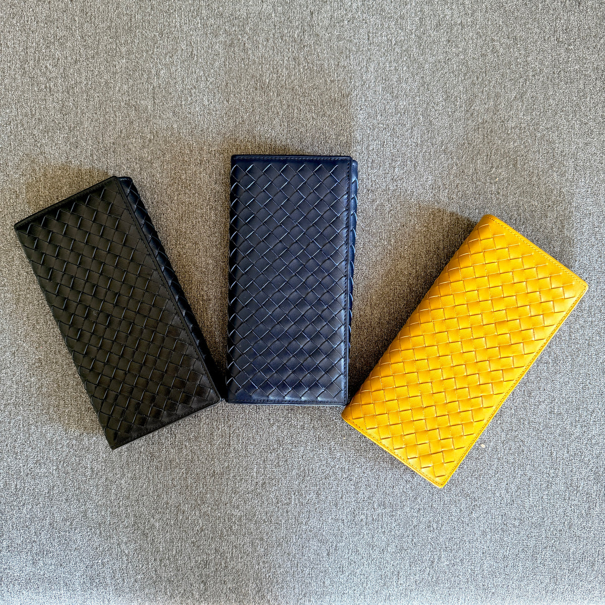 PORTAFOGLIO CONTINENTAL IN VERA PELLE INTRECCIATA 005