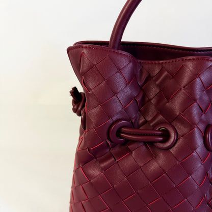 BORSA IN VERA PELLE INTRECCIATA CON LACCIO A COULISSE